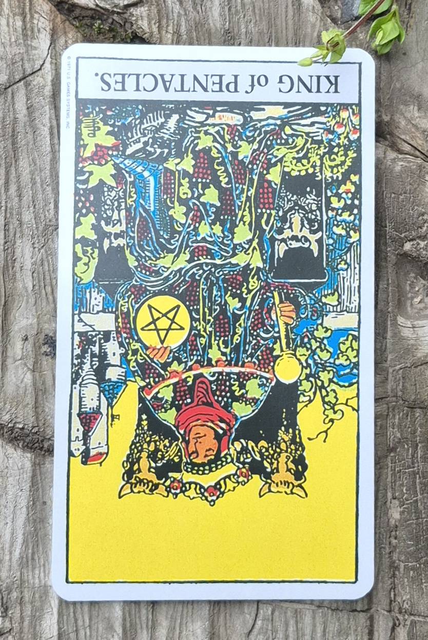 Taurus tarot card - King of Pentacles Reversed