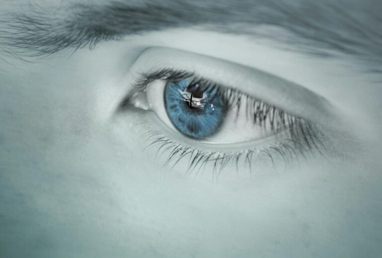 The Ability to See Clearly Has Always Been Inside You. Here Is How to Open It. Close-up blue eye with reflection clarity insight awakening