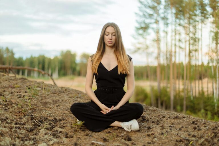 Your Meditation Practice Is Not Working. Here Is the Real Reason Why. Woman meditating peacefully outdoors in nature